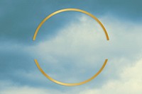 Gold round frame on a blue sky background
