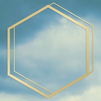 Gold hexagon frame on a blue sky background
