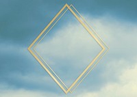 Gold rhombus frame on a blue sky background