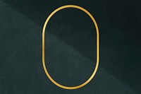 Gold oval frame on a dark gray concrete textured background