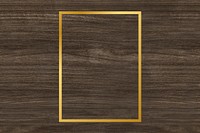 Gold rectangle frame on a wooden background