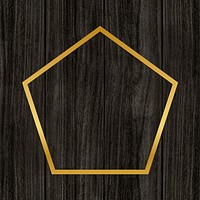 Gold pentagon frame on a wooden background