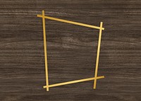 Gold trapezium frame on a wooden background