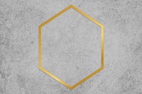 Gold hexagon frame on a gray concrete textured background