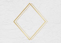 Golden framed triangle on a wall texture