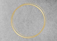 Gold circle frame on a gray concrete textured background