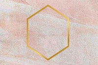 Gold hexagon frame on a rustic pastel pink background vector