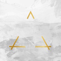 Gold triangle frame on a gray concrete textured background vector