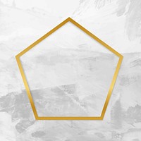 Gold pentagon frame on a gray concrete textured background vector