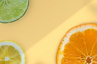 Delicious orange and lime citrus fruit slices flat lay design element