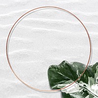 Leaf on round gold frame background