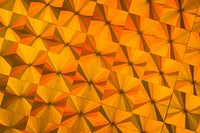 Metallic orange geometric patterned background vector