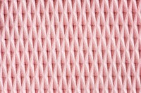 Pink patterned fabric textured background vector