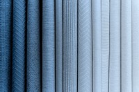 Blue range of fabric textured background vector