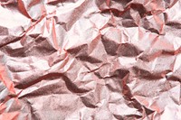 Crumpled pink paper background vector