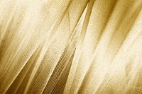 Silky gold fabric snakeskin textured background