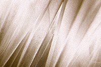 Silky gold fabric snakeskin textured background