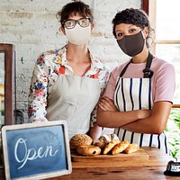 Staff in face masks at bakery shop