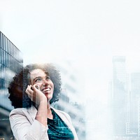 Young business woman on phone over city background