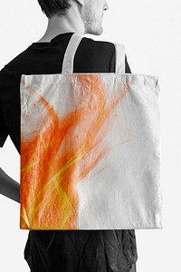 Man carrying a bag mockup psd with fire print