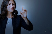 Senior businesswoman pointing on invisible screen