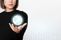 Businesswoman holding a high technology digitally generated globe