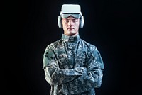 Soldier in VR headset for simulation training military technology black background