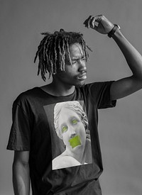 African american man wearing a feminist t shirt for feminism campaign