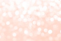 Peach defocused glittery background vector