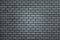 Gray brick wall textured background vector