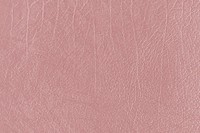Pink gold creased leather textured background vector