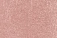 Rose gold creased leather textured background vector