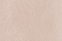 Beige creased leather textured background vector