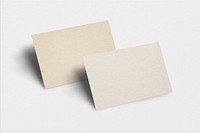 Blank business card mockup psd in light gold tone with front and rear view