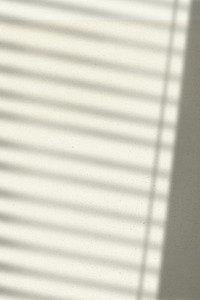 Background psd with window blind shadow during golden hour