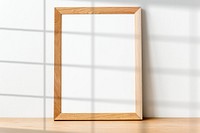 Wooden frame mockup psd with window shadow
