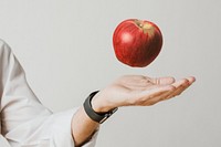 Apple above student&rsquo;s hand psd