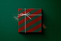 Christmas gift box wrapped in red and green paper