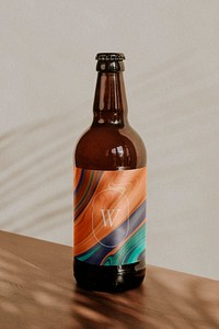 Bottle label mockup psd with fluid art pattern