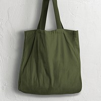 Green canvas tote bag with design space