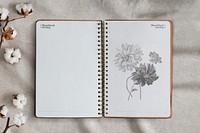 Empty notebook pages on floral background
