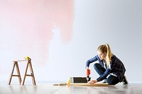 Wall mockup psd with woman renovating the house