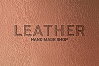 Emboss logo mockup psd for company on brown leather background