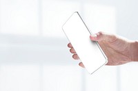 Hand holding smartphone psd with blank screen