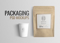 Cafe psd mockup with coffee bean pouch and paper cup