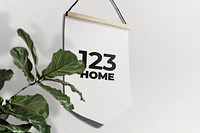 Hanging sign psd mockup on a wall