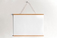 Hanging blank sign on a wall