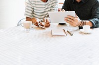 Colleagues discussing work psd on a table