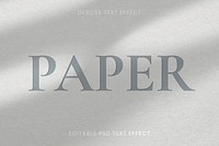 Debossed text effect psd editable template on paper texture background