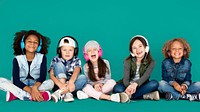 Group of Children Studio Smiling Wearing Headphones and Winter Clothes